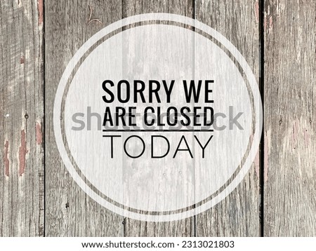 We are closed word concept on a blurred and grain background