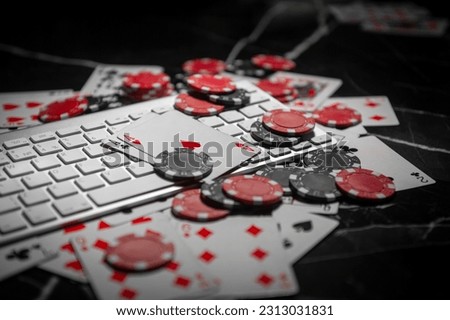 Online Gambling. Online Casino. Poker chips lie on the keyboard. Poker online. Internet. Royalty-Free Stock Photo #2313031831