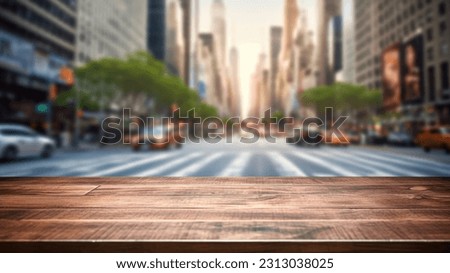 The empty wooden table top with blur background of NYC street. Exuberant image.