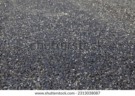 Asphalt texture on road surfaces Royalty-Free Stock Photo #2313038087