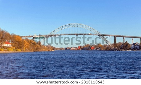 Steel Arch Bridge Over Glomma River in Fredrikstad Norway Autumn Day Royalty-Free Stock Photo #2313113645
