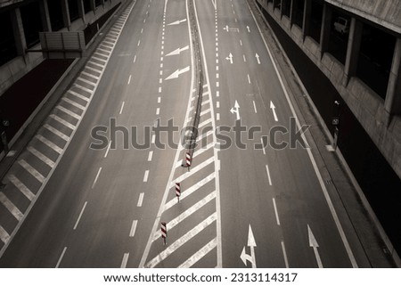 Four-Lane Road Between Tunnels - A Modern and Efficient Transportation Route. Royalty-Free Stock Photo #2313114317