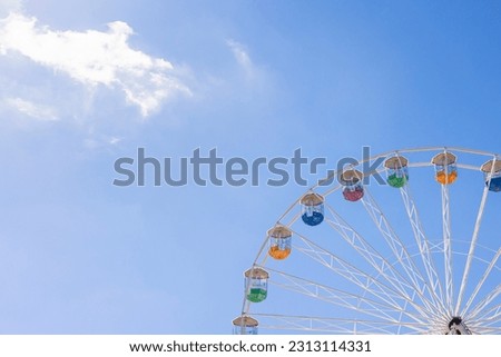 Bournemouth observation wheel, a giant Ferris wheel on the Dorset coast, UK. Detail against a blue sky with copy space Royalty-Free Stock Photo #2313114331