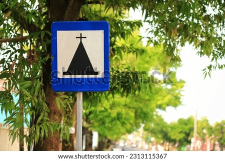 Traffic sign there church around here. Church traffic sign with blue color. traffic sign for guide people. traffic sign on side road