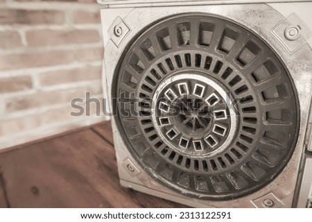 Close-up photo of Silver Old Radio tape recorder radio large magnetic speaker. Vintage, Unique, Rare collector item, collection, museum, old fashioned, cassette tape.