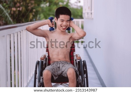 Asian young man holding dumbbell with happiness exercise his muscle in terrace at home, hospital, school, nursery with green nature background at sunset,Positive photography,Good mental health concept