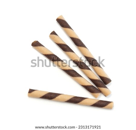 Wafer rolls with chocolate isolated on white background Royalty-Free Stock Photo #2313171921