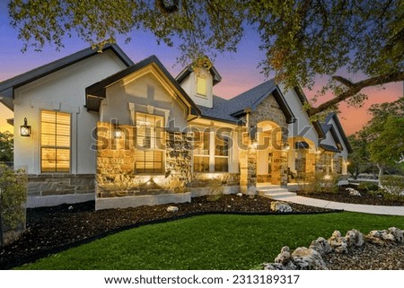 An American home at sunset  Royalty-Free Stock Photo #2313189317