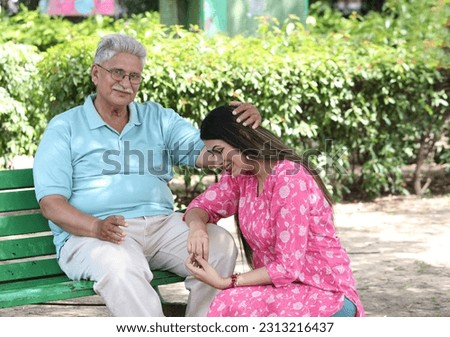Indian Senior happy father with his lovely daughter. A father-daughter bonding loving and care. family bonding, family care, elderly care