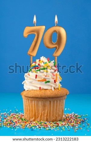 Candle number 79 - Cake birthday in blue background