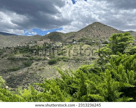 View of Jerome, Arizona on the hillside in the distance from the Jerome State Historic Park. Royalty-Free Stock Photo #2313236245