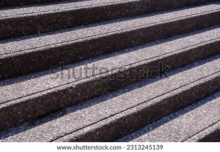 Abstract architectural detail, part of floor and stair, stone and cement material, line, texture and pattern 