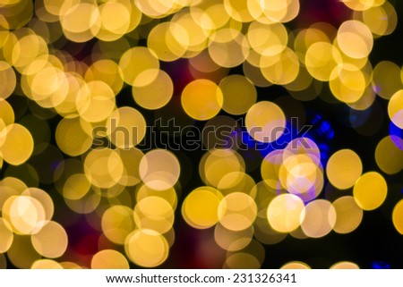 Bokeh  Defocused ligths of golden Christmas tree background