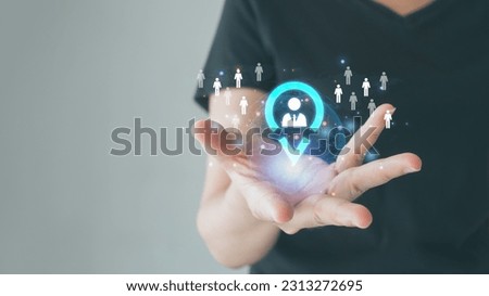 Business people showing the target customer on hand. Target customer, buyer persona, customer behavior concept. Marketing plan and strategies. Personalization marketing, customer-centric strategies. Royalty-Free Stock Photo #2313272695