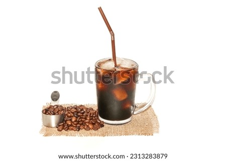 Americano Ice Coffee,
with coffee beans spread around cup,concept picture for copy space and background,
refreshing and good feeling,
