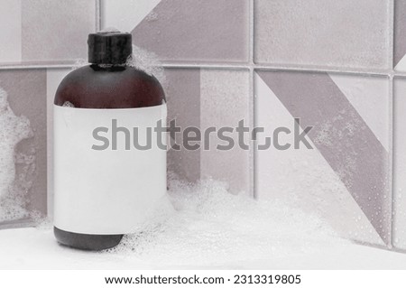 Bath foam bottle mockup for packaging. In bathroom. Place for text and logo.