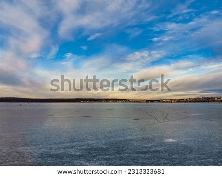 Nature. Winter snow-white frozen pond. Russia