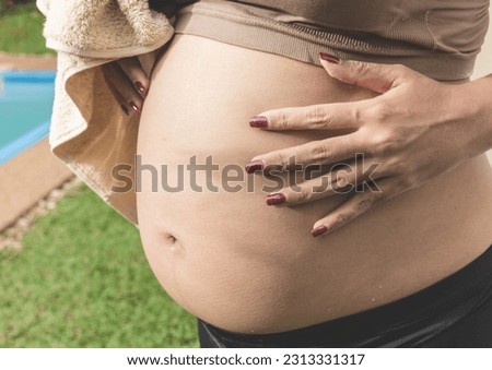 pregnant woman 6 months pregnant Royalty-Free Stock Photo #2313331317