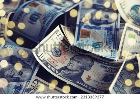 Money, US dollar bills background. Money scattered on the desk. Photography for Finance concepts. 