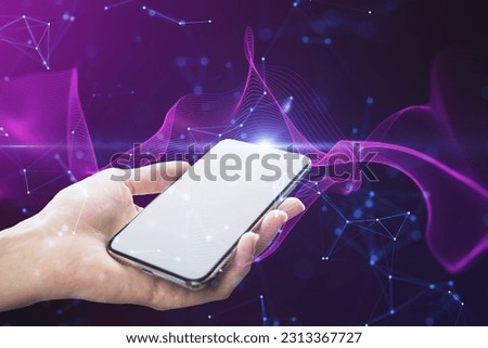 Close up of female hand holding white mock up cellphone with creative glowing purple metaverse space background. Abstract world and innovation concept