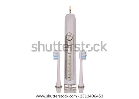 One electric toothbrush, macro, isolated on a white background.