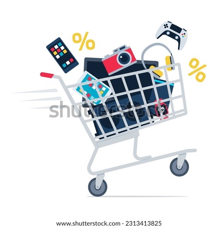 Fast shopping cart full of consumer electronics, shopping and technology concept Royalty-Free Stock Photo #2313413825
