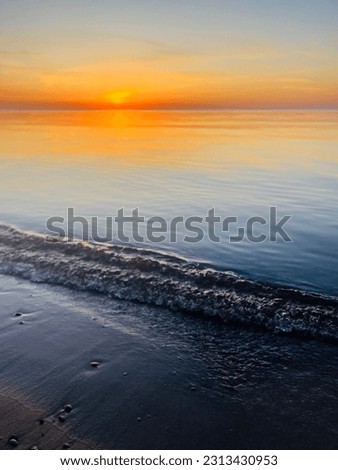 Orange sea sunset, evening orange sea horizon, reflection, calm sea surface