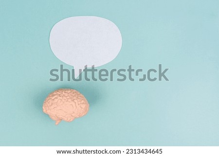 Brain think. Brain on a blue background. Place for text. The brain generates ideas. Concept photo. What people think, a place for thoughts and ideas. Allegory of decision and creative search.