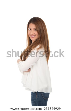 young woman folding her arms against a white background