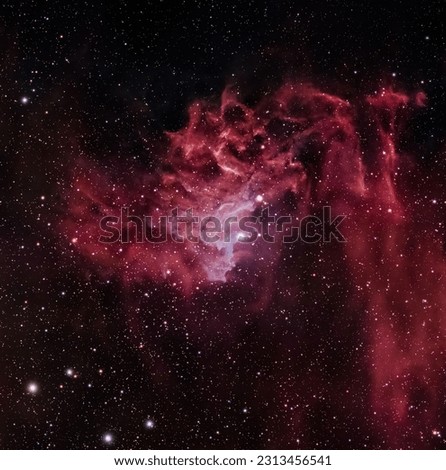 a large star cluster in the middle of a night sky

