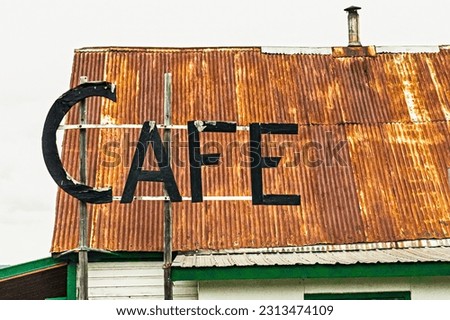 Hope, alaska, rustic roof and cafe sign