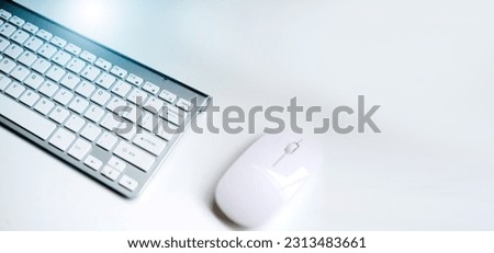 Modern white laptop keyboard closeup
