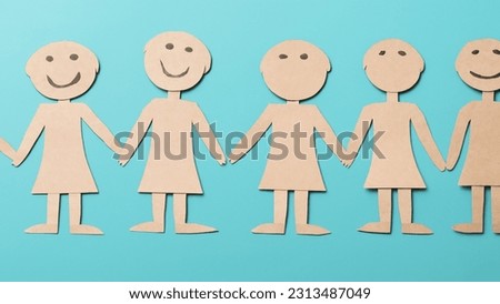 Paperboard Cutouts of Happy People in Cartoon Style