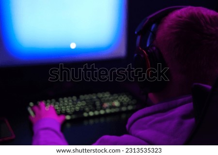 Gamer young man plays online