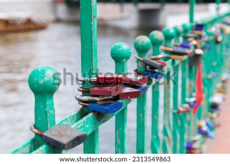 Bridge of lovers with hanging padlocks.