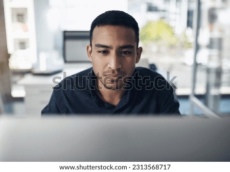 Computer, focus and business man reading online for information technology, software development and web code. Coding, programming and IT person or worker on desktop pc for system review or check Royalty-Free Stock Photo #2313568717