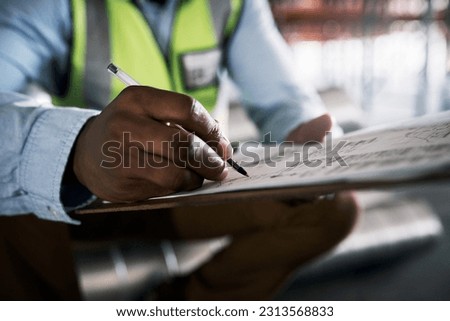 Man, architect and hands writing on checklist for inventory, inspection or construction paperwork on site. Hand of male contractor working on documents for planning, architecture or idea strategy Royalty-Free Stock Photo #2313568833