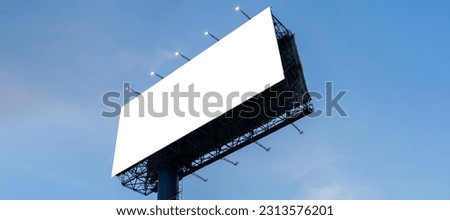Blank billboard against the sky. Mockup. Blank billboard mockup with white screen with clouds and blue sky background, copy space banner for advertising business concepts. clipping path