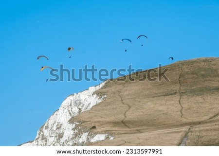 Hang-gliders over Cap Blanc-Nez cliffs near Calais, France