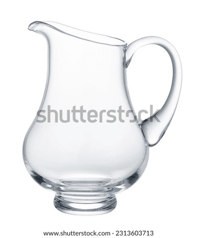 Glass jug for juice isolated on white Royalty-Free Stock Photo #2313603713