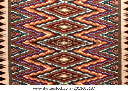 Native American Navajo textile fabric, Arizona, USA. Royalty-Free Stock Photo #2313605187