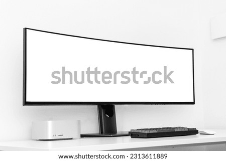 Modern workplace with computer and wi-fi router near light wall