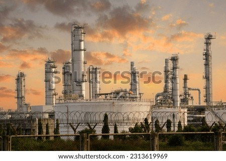 Oil and Gas Industrial zone,The equipment of oil refining,Close-up of industrial pipelines of an oil-refinery plant,Detail of oil pipeline with valves in large oil refinery. Royalty-Free Stock Photo #2313619969