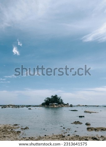 Simping Island which is the smallest island in Indonesia. Royalty-Free Stock Photo #2313641575