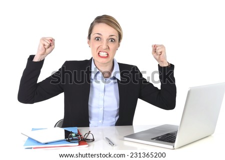 young attractive businesswoman frustrated and desperate expression at office working on computer laptop in stress at work concept screaming angry isolated on white background