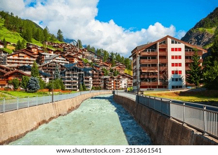 Traditional local houses near the Matter Vispa river in the centre of Zermatt town in the Valais canton of Switzerland