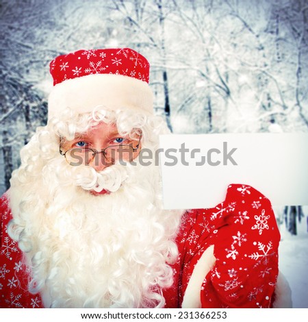 Vignetting Photo of Santa Claus showing Blank Paper in the Winter Forest