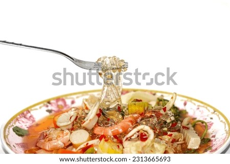 Seafood Salad with Thai Seafood looking good taste put on the white background,concept isolated picture.