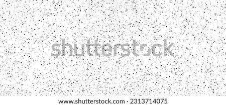 Seamless dotted pattern. Black noise grain repeating texture. Particles, splashes, drops, pieces, specks, speckles wallpaper. Random grunge grit background. Vector backdrop Royalty-Free Stock Photo #2313714075