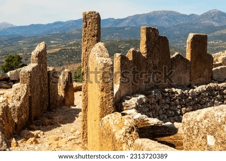Ancient Tomb Stones in the Grave Circle at the Archaeological Site of Mykines Greece Royalty-Free Stock Photo #2313720389